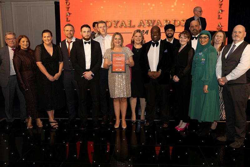 Angela Davis with her team at the Royal Awards