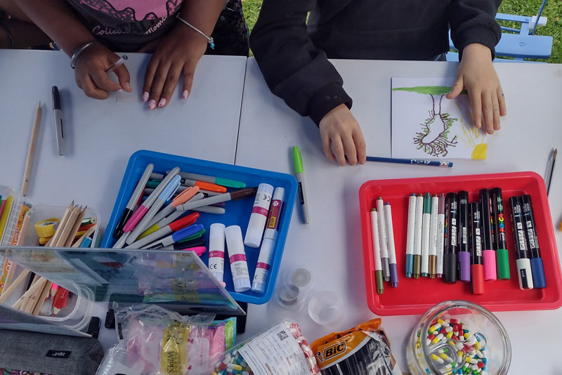 Children creating get well soon cards