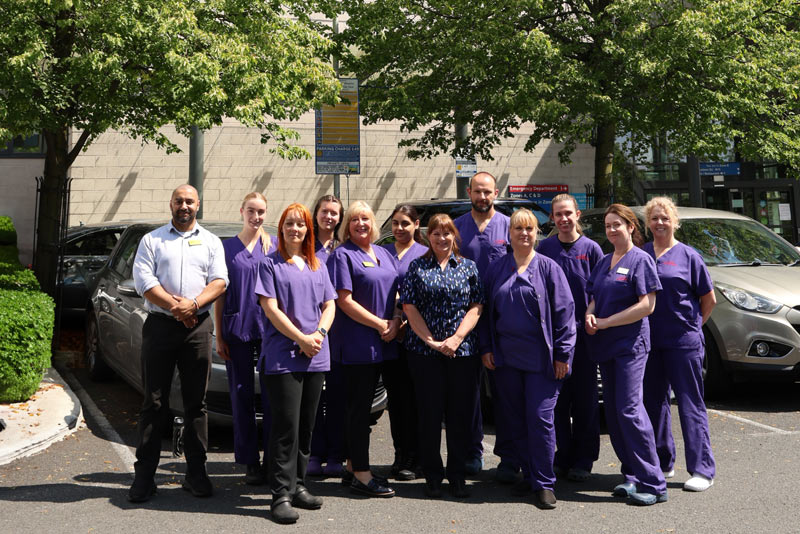 Members of the Cardiac Investigations Team outside the Heart and Lung Centre at New Cross Hospital