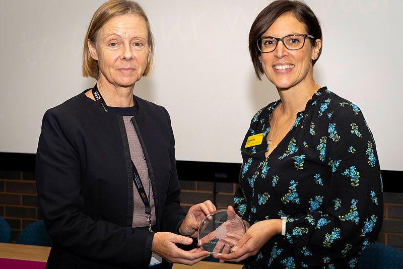 Charlotte Shillito receiving an AHP Award from Caroline Walker, interim Chief Executive of RWT