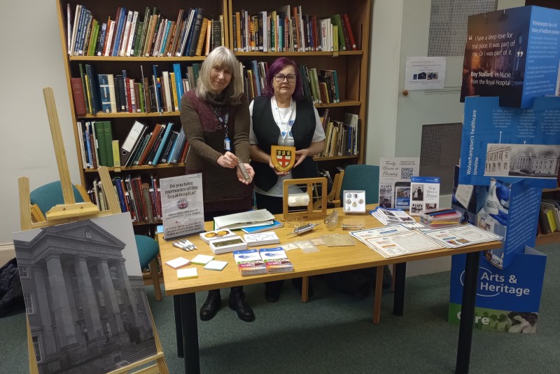 Helen Steatham and Helen Trainer with some of the exhibits at the history fair