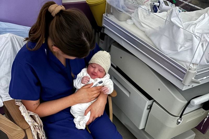 First New Year baby born at New Cross Hospital with midwife, Amira Purcell