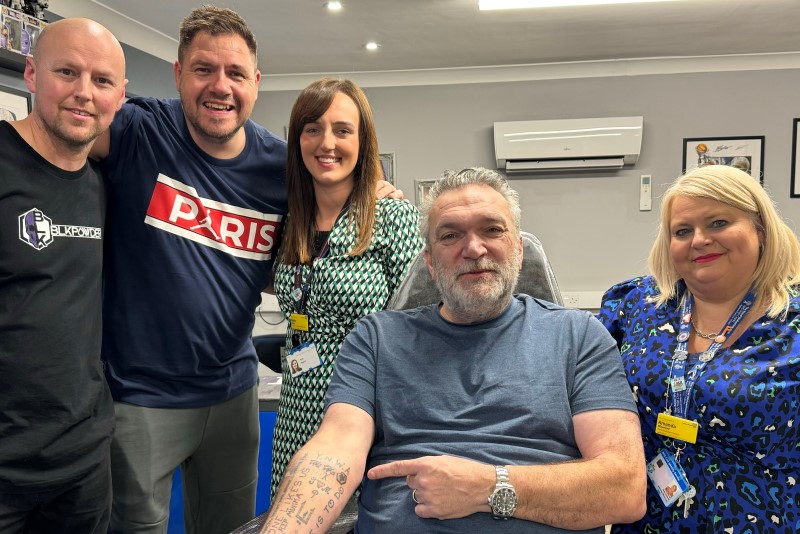 Latest News: Neil 'Razor' Ruddock having his tattoo, with, from left, Craig James, Jason Guy, Amie Rogers, Digital Fundraising Officer at The RWT Charity and Amanda Winwood