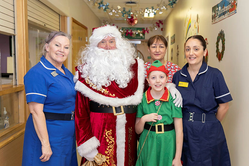 Latest News: Santa Claus and members of staff