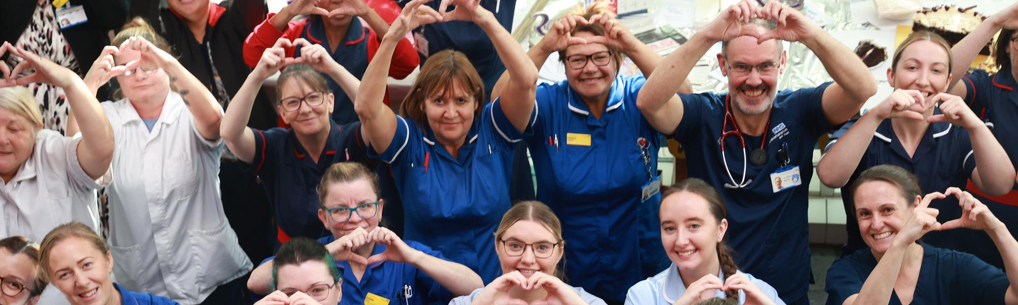 Royal Wolverhampton staff giving the heart sign